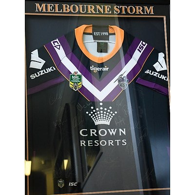 Framed and signed 2018 Melbourne Storm jersey.