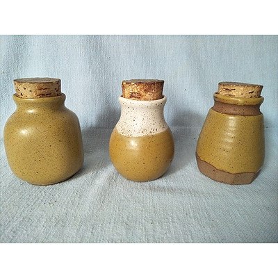 Set of 3 vintage pottery spice jars with cork stoppers
