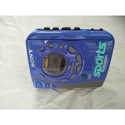 SONY sports walkman (cassette radio) with SONY ear buds in separate case (MINT CONDITION & WORKING)