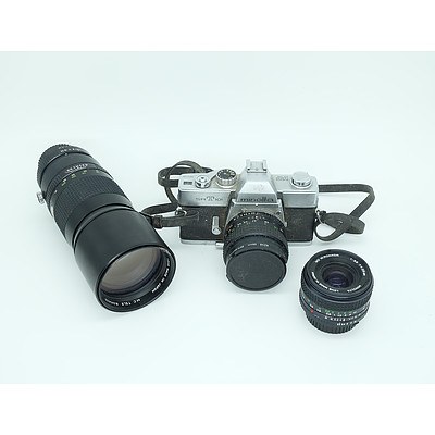 Minolta SRT-100 Camera with Three Lenses