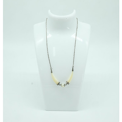 Mother of Pearl Tusk Necklace and a Silver Coloured Metal Necklace