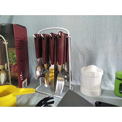 Assorted cutlery and utensils including 24 piece cutlery set on stand