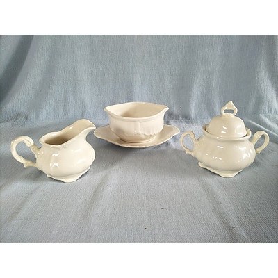 3 piece glazed ceramic set (jug, bowl and saucer, sugar bowl)
