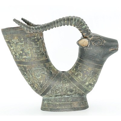 Chinese Bronze Patinated Cast Metal Archaistic Style Goat Form Rhyton 20th Century, Now Drilled and Converted to a Lamp Base