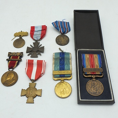 A Group of Medals and Medallions, Including a Kings Medal and a WWII Japanese Army China Incident War Medal 1937-1945 With Original Box
