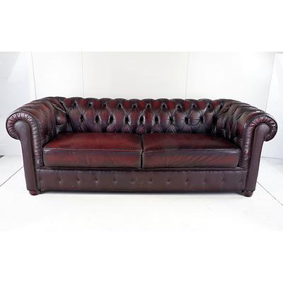 Burgundy Faux Leather Three-Seater Chesterfield