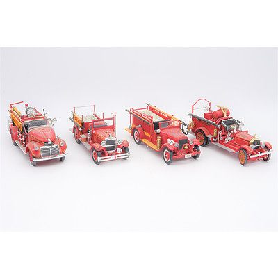 Group of Four Fire Engines Including CMC, Studebaker, American LaFrance and REO