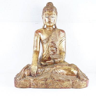 A Large Carved, Gilded and Lacquer Decorated Wood Figure of Buddha with Glass Embellishments, Probably Burma, Late 20th Century