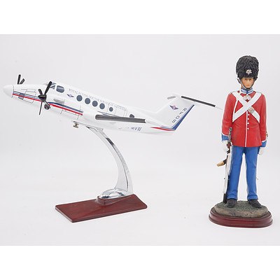 Royal Flying Doctor Service of Australia Plane and A Danish Royal Guard Figure