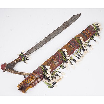 Borneo Dyak Peoples Mandau Knife, Antler Handle with Hand Painted Sheath Embellished with Teeth and Fur