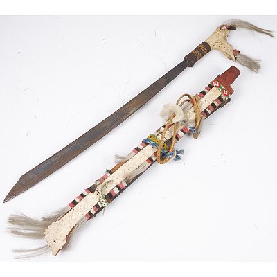 South East Asian Bone Handled Sword With Carved Bone, Beadwork and Fur Sheath