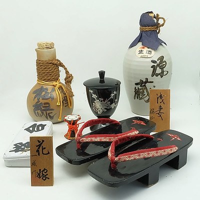 Group of Japanese Collectables, Including Geisha Dolls, Sake Bottles and More 