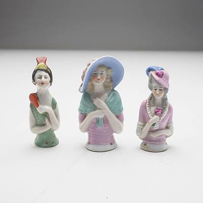 Three Porcelain Pin Cushion Half Dolls and a Hummel Figurine