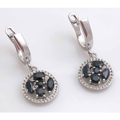 Sterling Silver Earrings - set with dark blue Sapphires