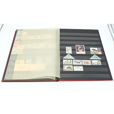 Three Stamp Albums With Stamps From Helvetia, Portugal, Romania, Uruguay, Australia and More