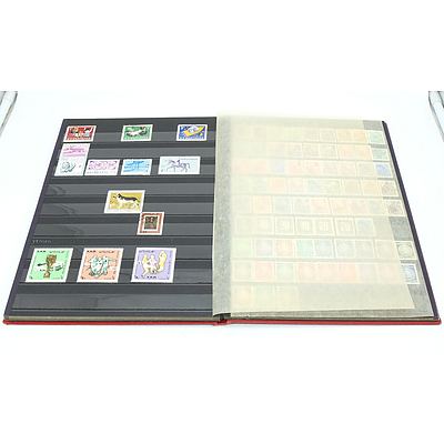 Three Stamp Albums With Stamps From Helvetia, Portugal, Romania, Uruguay, Australia and More