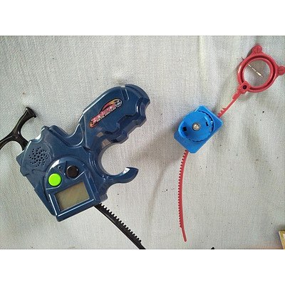 Assorted Beyblades toys and accessories