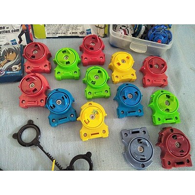 Assorted Beyblades toys and accessories