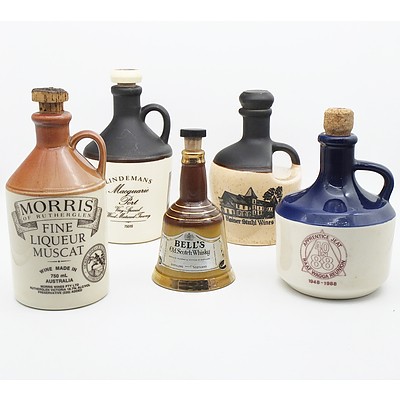 Group of Five Port Bottles Including Bell's Old Scotch Whiskey, Lindemans Macquarie Port and More