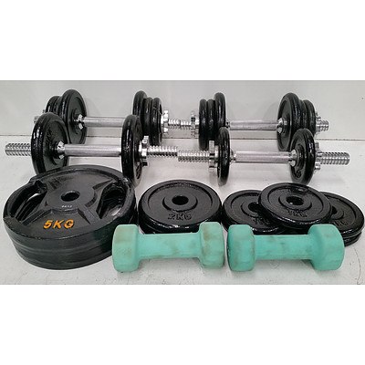 Four Dumbells and 25 Free Weight Discs