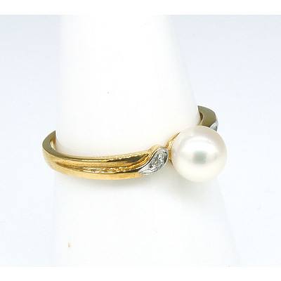 9ct Yellow Gold Ring with a Round Cultured Pearl and a Small Brilliant Cut Diamond in Each Shoulder