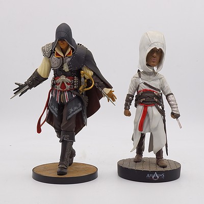 Two Assassins Creed Figures