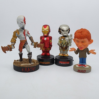 Group of Four Figurines, Including Mad, Iron Man, Predator and More