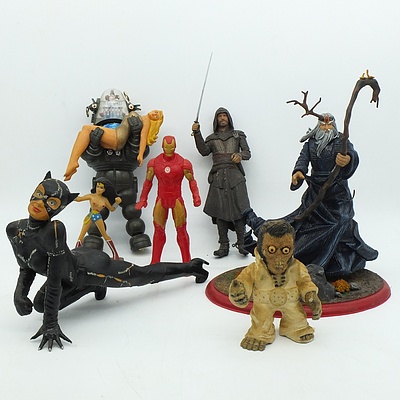 Group of Figurines, Including Cat Women, Lord of the Rings, Iron Man and More