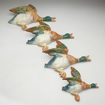 A Set of Four Beswick Porcelain Flying Ducks Wall Plaques 
