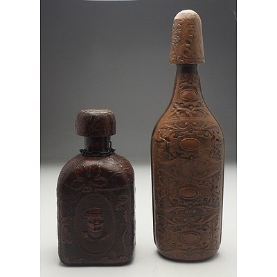 Two Vintage Embossed Leather Wrapped Decanters