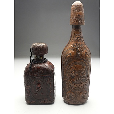 Two Vintage Embossed Leather Wrapped Decanters