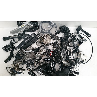 Assorted Boxes Of Bike Accesories Including Cranks, Brakes & More.