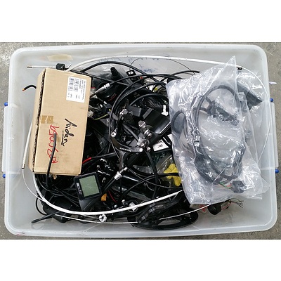 Assorted Box Of Electric Bike Accesories Including Battery Chargers, Hubs & More.
