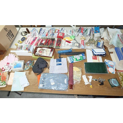 Large Group of Household Items, Including Tooth Brushes, Various Types of Sheets, Paper Shredder and More