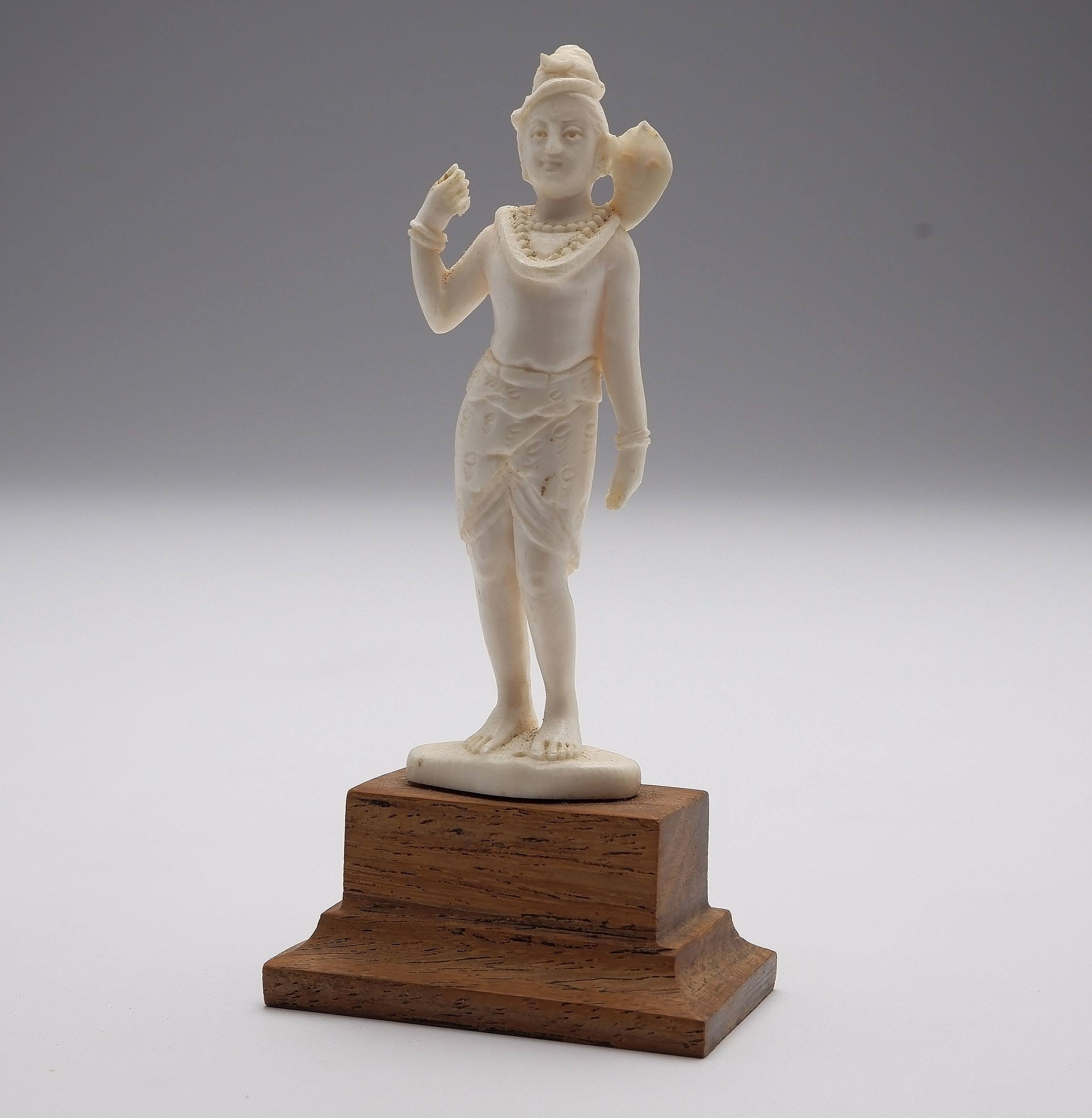 'Indian Carved Ivory Figure of a Snake Charmer, Early to Mid 20th Century'