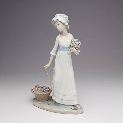 Lladro Figure of a Girl Pulling a Basket of Wild Flowers, Retired in 1994