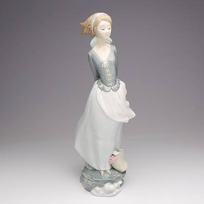 Lladro Figure of a Women with Flowers and a Book