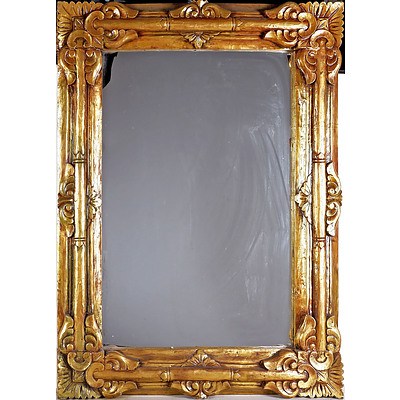 Carved and Gilt Framed Mirror, Probably Balinese, Later 20th Century