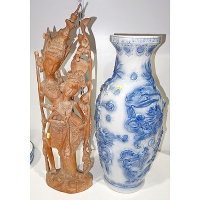 Large Relief Moulded Blue and White Vase and a Balinese Carving