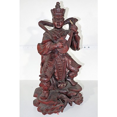 Carved Hardwood Figure of a Chinese Musician