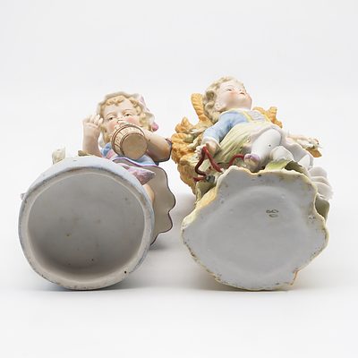 Two Bisque Porcelain Figural Vases