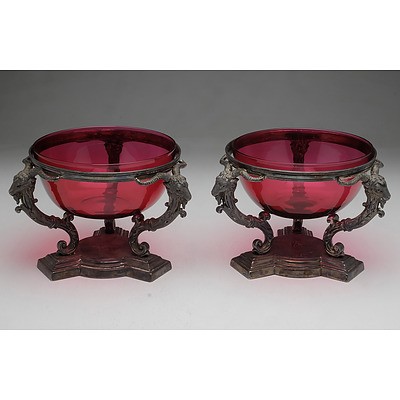 Pair Victorian Crested and Monogrammed Electroplated and Ruby Glass Bonbonnieres With Ram Form Supports