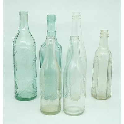 Six Vintage Glass Bottles Including a E.K Cordials Bottle and More