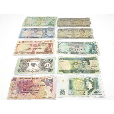 Ten International Banknotes From England, Fiji, Solomon Islands, PNG and the Republic of Biafra