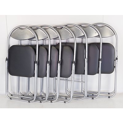 Seven Metal and Black Cushioned Collapsible Chairs