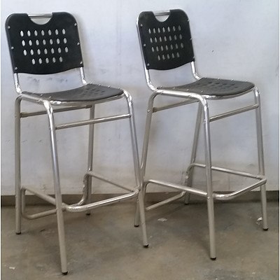 Seven Black and Chrome Bar Chairs
