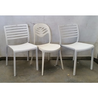Group of Various White Chairs