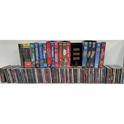 Assorted CD's and VHS Video Cassettes - Lot of 120