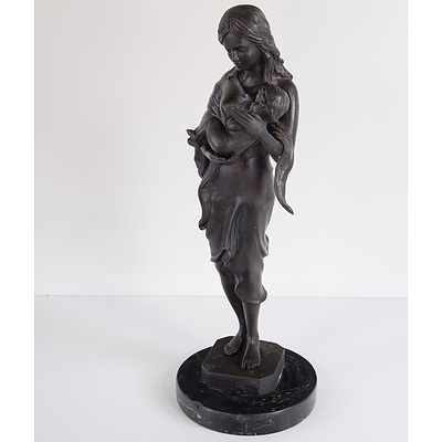 Bronze Statue of a Mother Cradling a Child