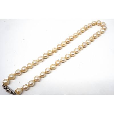 Strand of Baroque Cultured Pearls, Creme with High Lustre, Akoya Type 